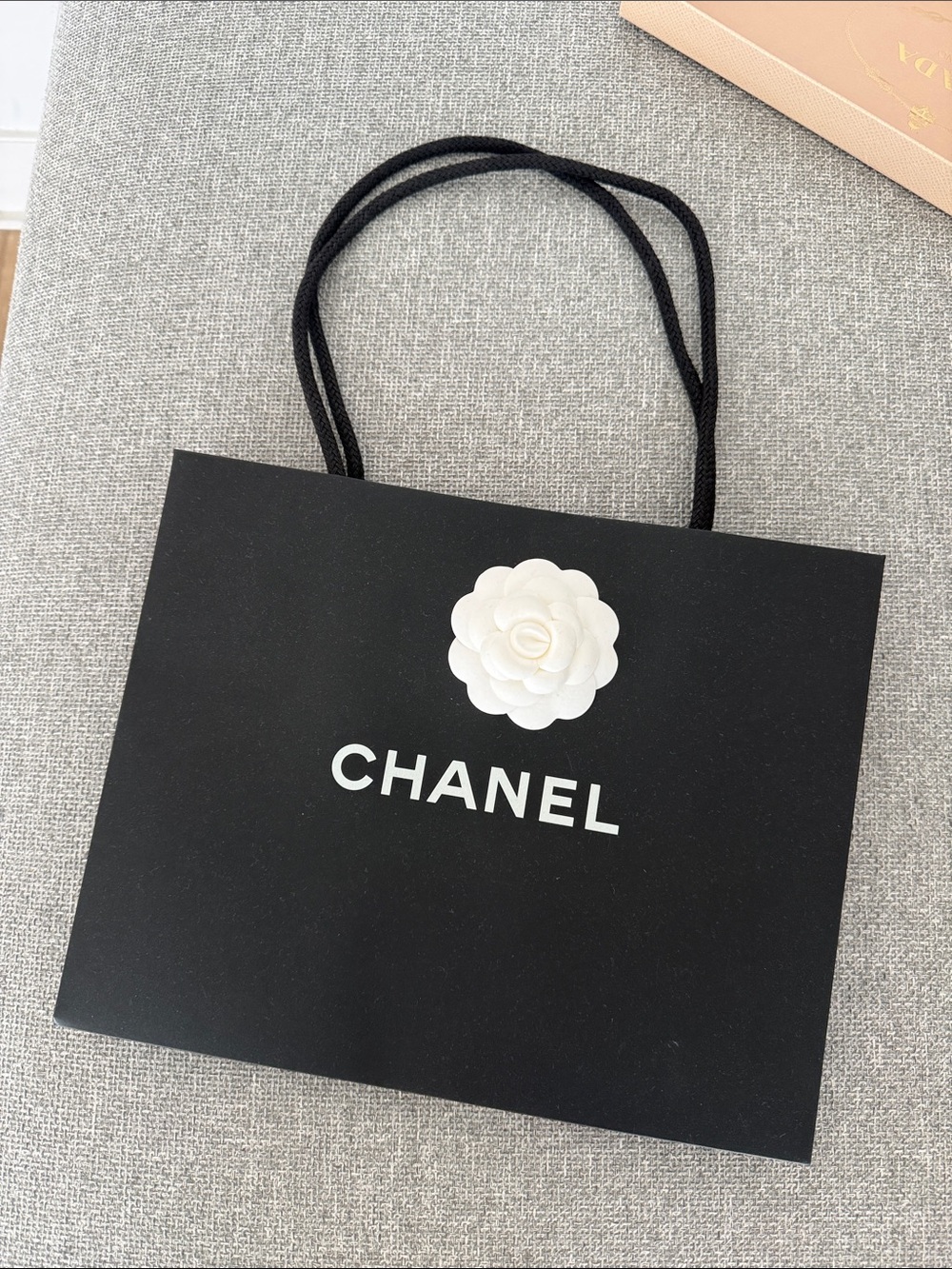 CHANEL Black Tote with White Camellia Accent